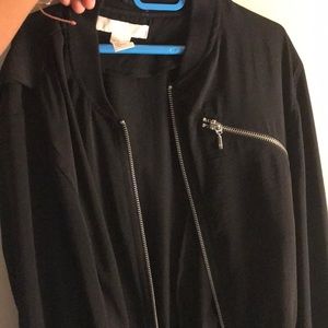 black bomber jacket with silver zipper